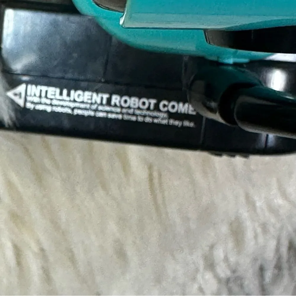 Interactive Turquoise and Black Robot Toy
